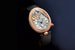 Breguet. Reine de Naples 8908. Корпус из розового золота со 128 бриллиантами, циферблат из таитянского перламутра. Фазы Луны и индикатор запаса хода в положении «12 часов»