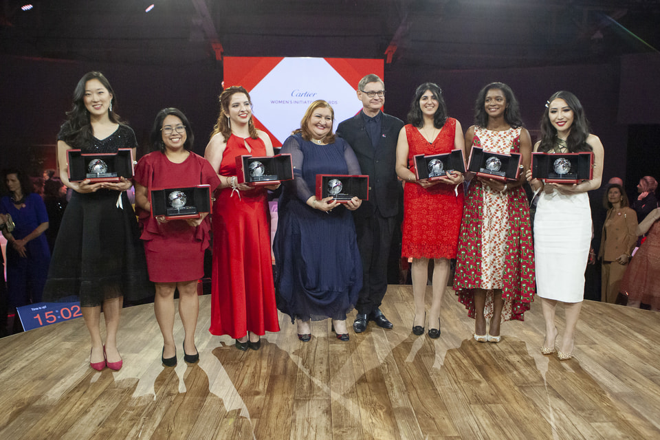 Президент Cartier Сирилл Виньерон c лауреатами премии Cartier Women's Initiative 2019