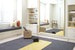 Покой и медитацияКомната для занятий йогой от канадской архитектурной фирмы Reena Sotropa в умиротворяющих пастельных тонах с зоной для отдыха и компактной системой хранения