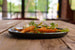 Сococo bistroНа острове Новая Голландия в отреставрированном корпусе № 12 открыт Cococo bistro – ресторанный проект Матильды Шнуровой, ставший новым витком развития ее знаменитого «Кококо», занимающего 104-ю строчку в престижном мировом рейтинге The World’s 120 Best Restaurants. Бистро – это первый из двух островных проектов команды «Кококо» – позже в правом крыле откроется второе направление, fine-dining-ресторан Cococouture. Компактное меню Cococo bistro – воплощение casual-версии русской кухни от Игоря Гришечкина. Здесь шеф-повар дает волю своей страсти к уличной еде и национальным кухням, сохранив акцент на сезонности, локальных продуктах и русском вкусе: зеленые щи из крапивы и русско-финская уха, домашняя паста с томленой говяжьей щекой в грибной мисо-карамели или пельмени с кроликом в бульоне из печеных овощей, хот-дог с огуречным релишем и бургер с кетчупом из маринованных томатов. Также здесь можно найти фирменные мясные деликатесы, свежую выпечку и хлеб из собственной пекарни, специальное меню завтраков.