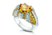 Редкий желто-оранжевый бриллиант треугольной формы весом 5,02 карата по центру кольца Raggio di Luce схож с энергетическим потоком