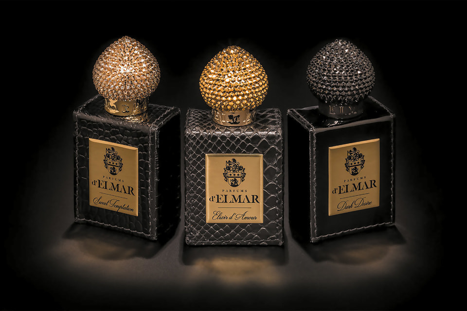 Крышки флаконов Parfums D’Elmar украшены кристаллами Swarovski