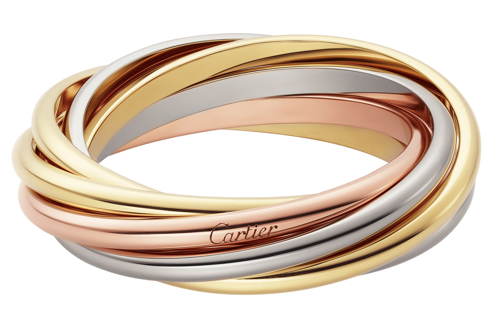 Впервые за 97 лет дизайнеры Cartier увеличили кольцо Trinity до семи окружностей вместо изначальных трех