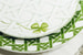 Тарелки из сервиза Cannage Provence с фирменным узором Дома Dior каннаж, выполненном в свежих зеленых цветах