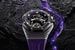 Элементы фиолетового цвета и прорисованные лазером по PVD-покрытию текстуры механизма отсылают к костюму Черной Пантеры