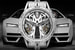 Механизм часов Roger Dubuis Excalibur Spider Countach DT/X с двумя турбийонами, расположенными под углом 90 градусов напоминает двигатель Lamborghini