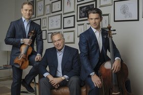 Карл-Фридрих Шойфеле, сопрезидент Chopard, с братьями Капюсон&nbsp;– скрипачом Рено и виолончелистом Готье